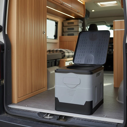 Way2Camp portable folding toilet in grey and black, set up inside a camper van for convenient outdoor bathroom use.