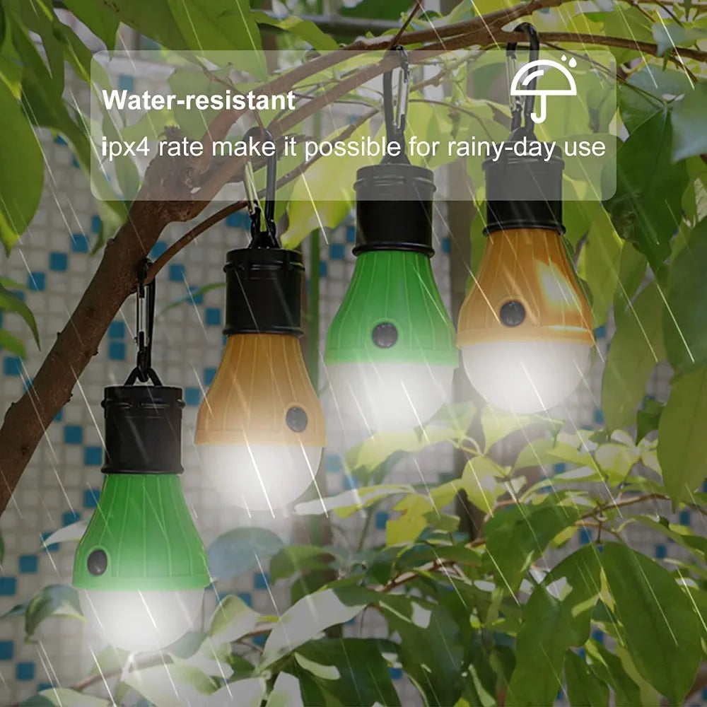 Way2Camp portable 3LED camping lantern hanging above a group of friends sitting around a campfire at night