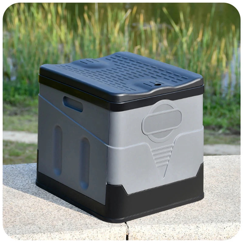 Way2Camp portable folding toilet in grey and black, set up inside a camper van for convenient outdoor bathroom use.